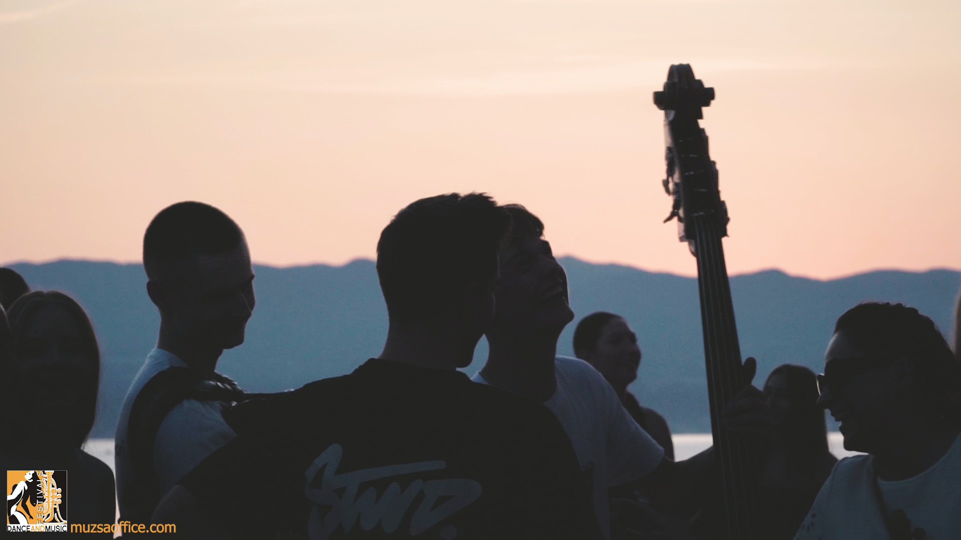 International folk dancers in colorful costumes at a European folklore festival, showcasing cultural diversity and friendship between music bands.