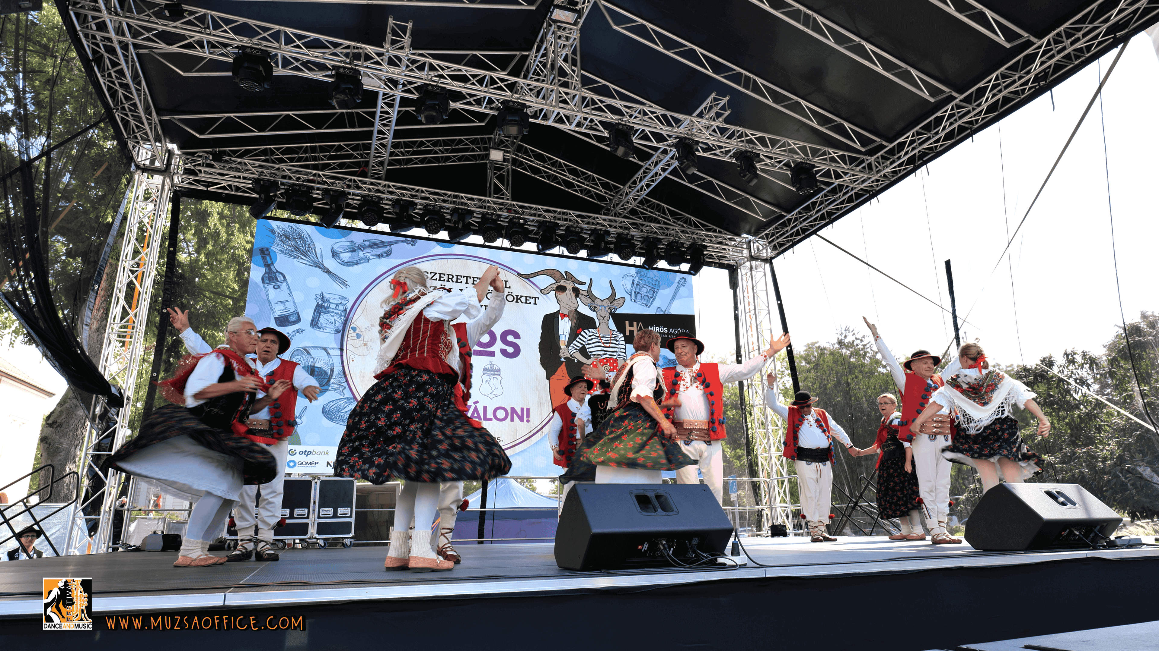 An evening performance under the lights in Kecskemet's main square.